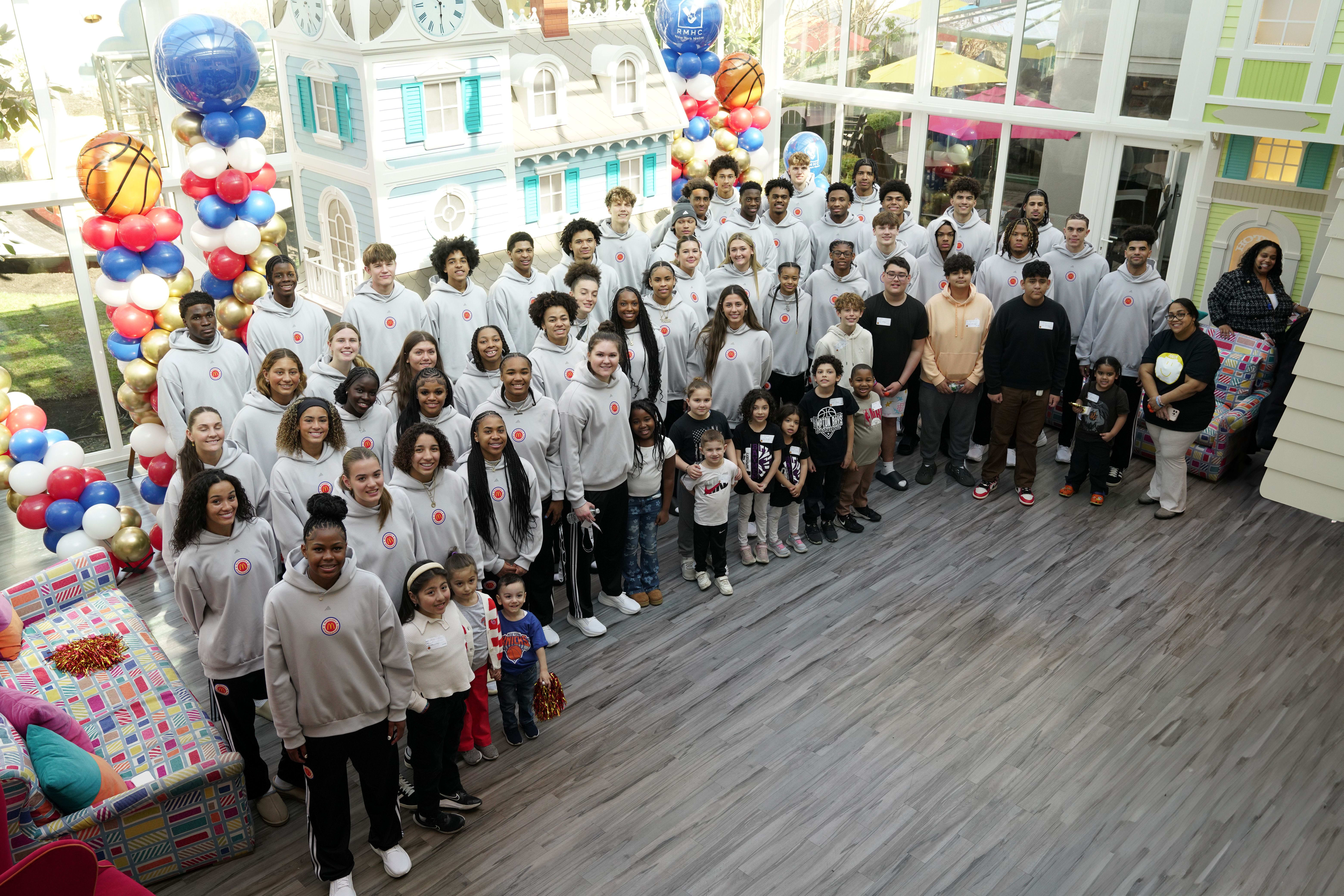 McDonald's All American players with Ronald McDonald House children and families.