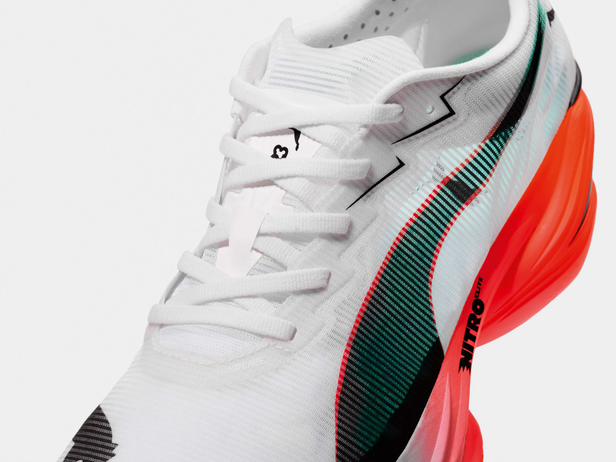 White and black PUMA running shoe.