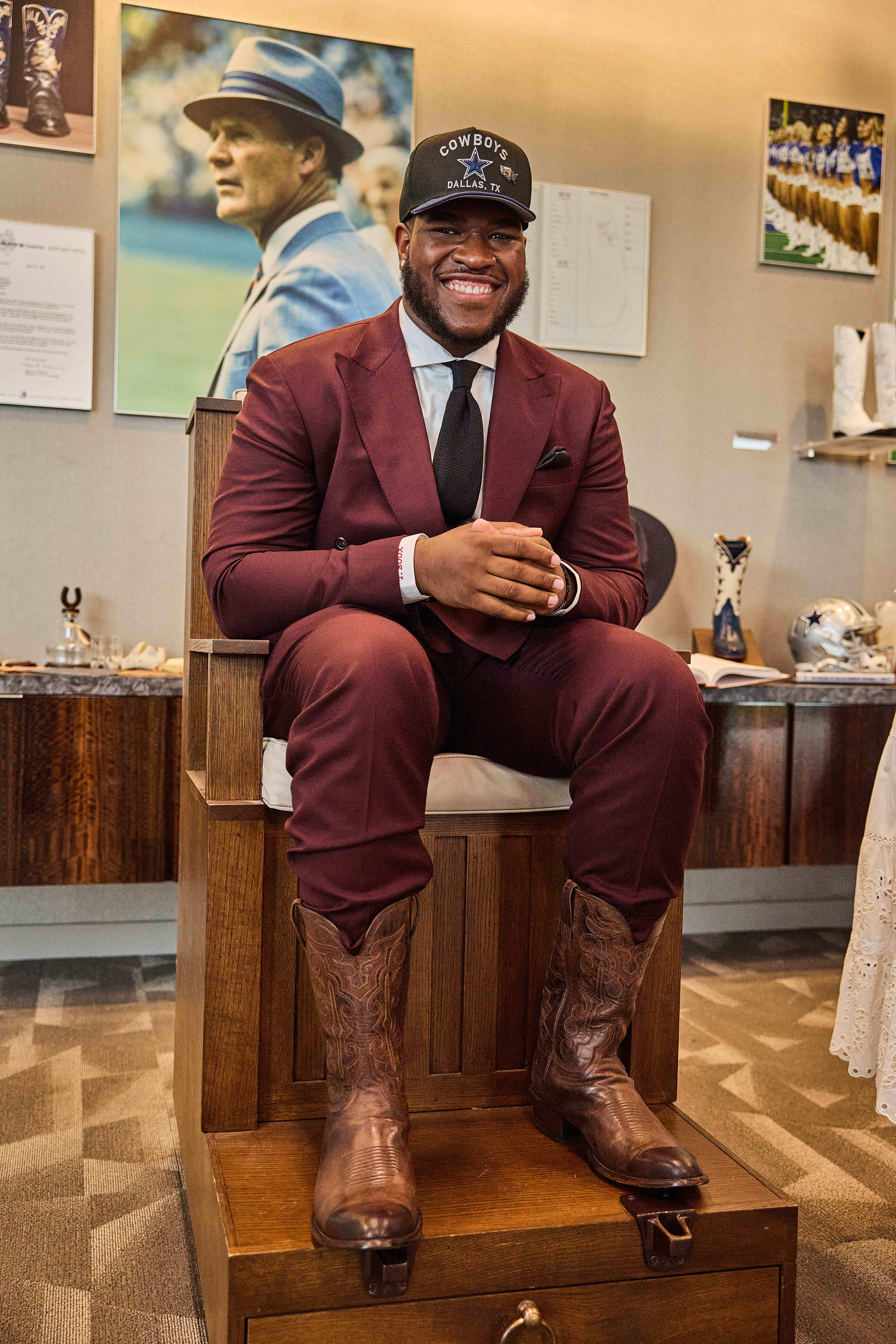 Tyler Booker models boots.