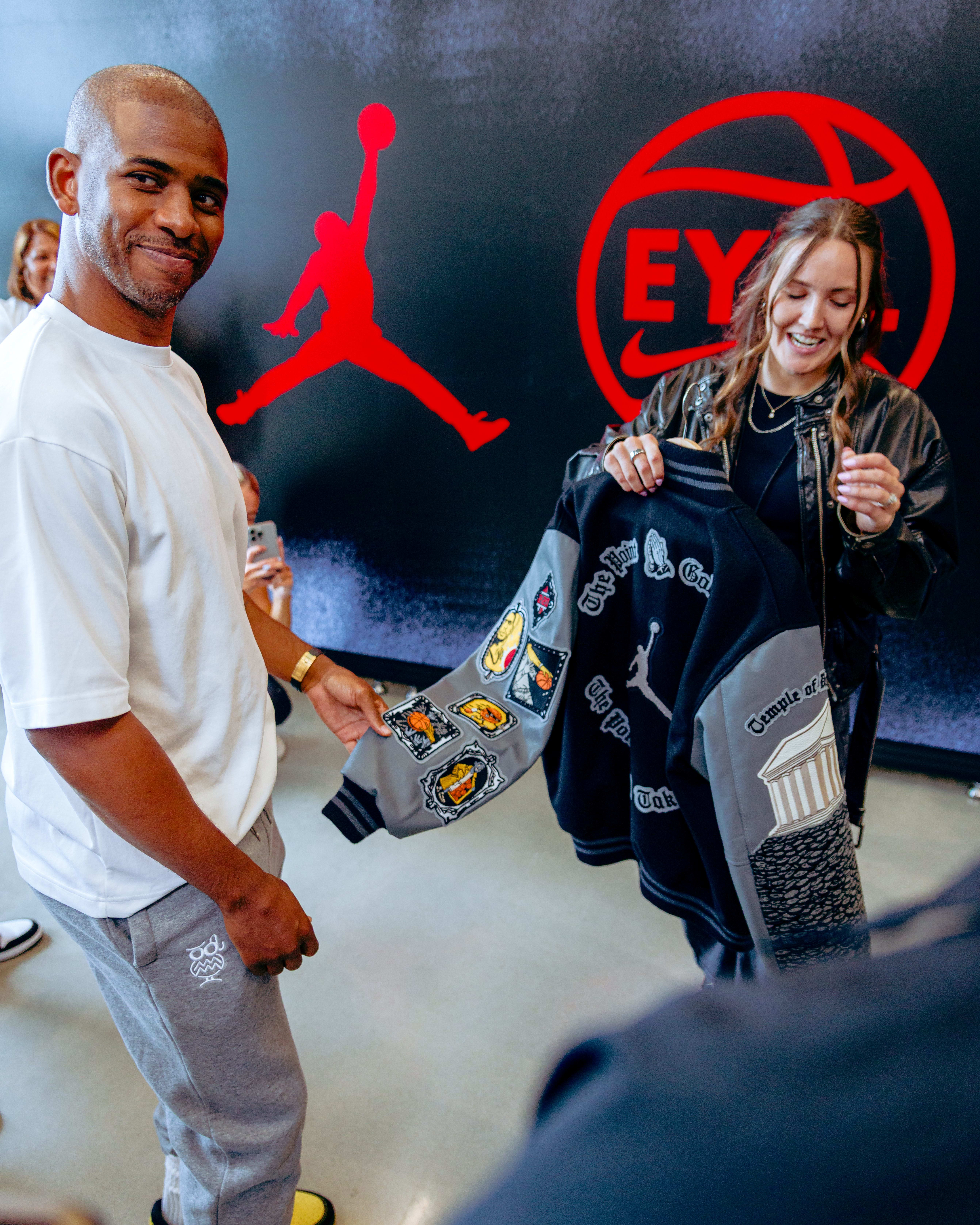 Chris Paul receives a custom Jordan Brand jacket.