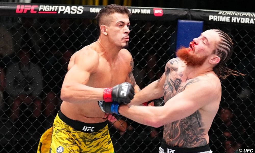 Marco Tulio punches Ihor Potieria in a middleweight fight during the UFC Fight Night event at UFC APEX.