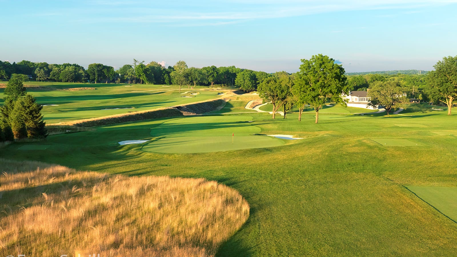 The uphill par-4 11th with the old train track running through the course. 