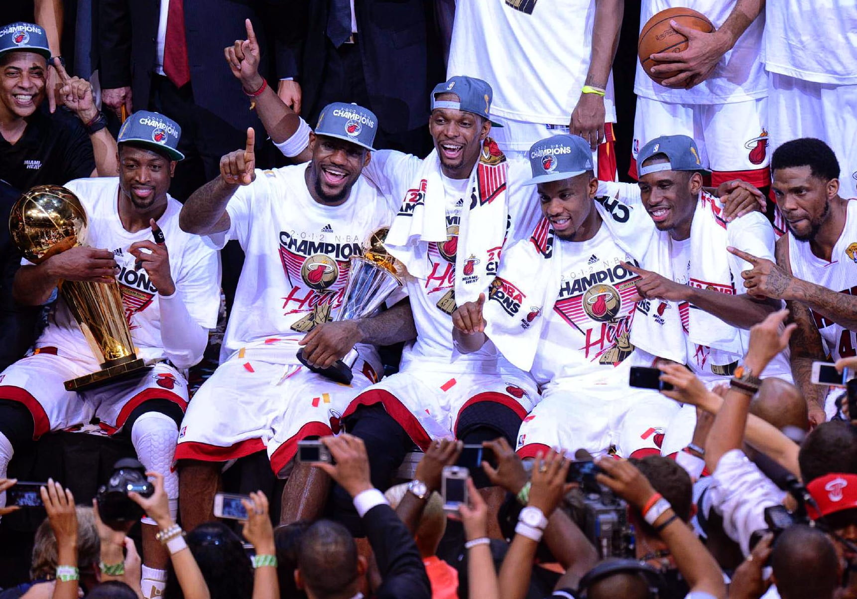 Wade, James, Bosh, Norris Cole, Terrel Harris and Udonis Haslem celebrate winning the 2012 NBA title.