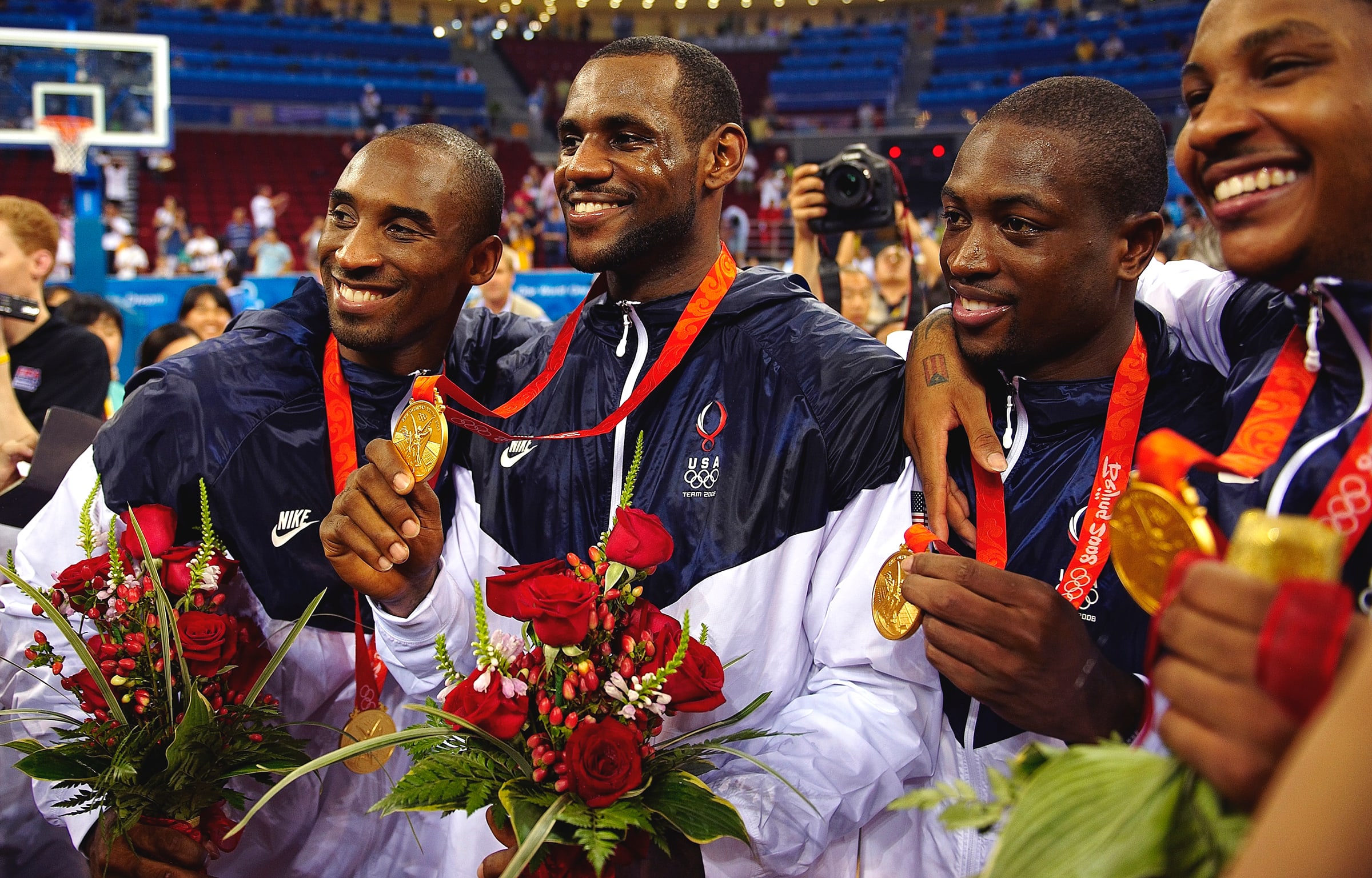 Bryant and James celebrate after winning the gold medal at the 2008 Beijing Olympics.