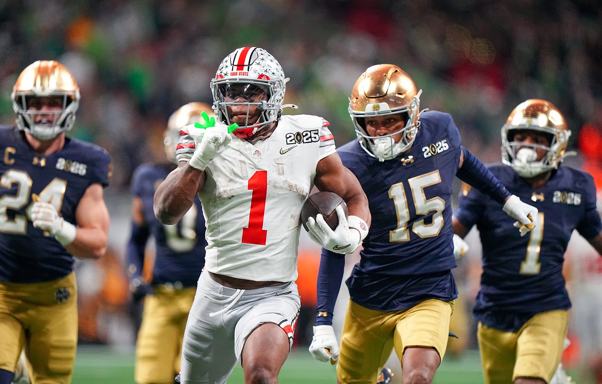 Judkins rumbles toward the end zone with Irish defenders in pursuit.