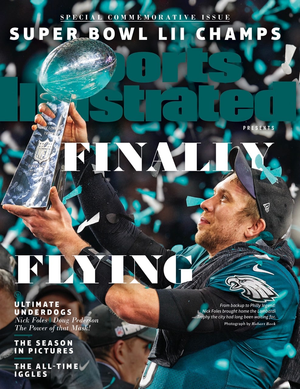 Philadelphia Eagles Nick Foles holds up Lombardi trophy February 2018