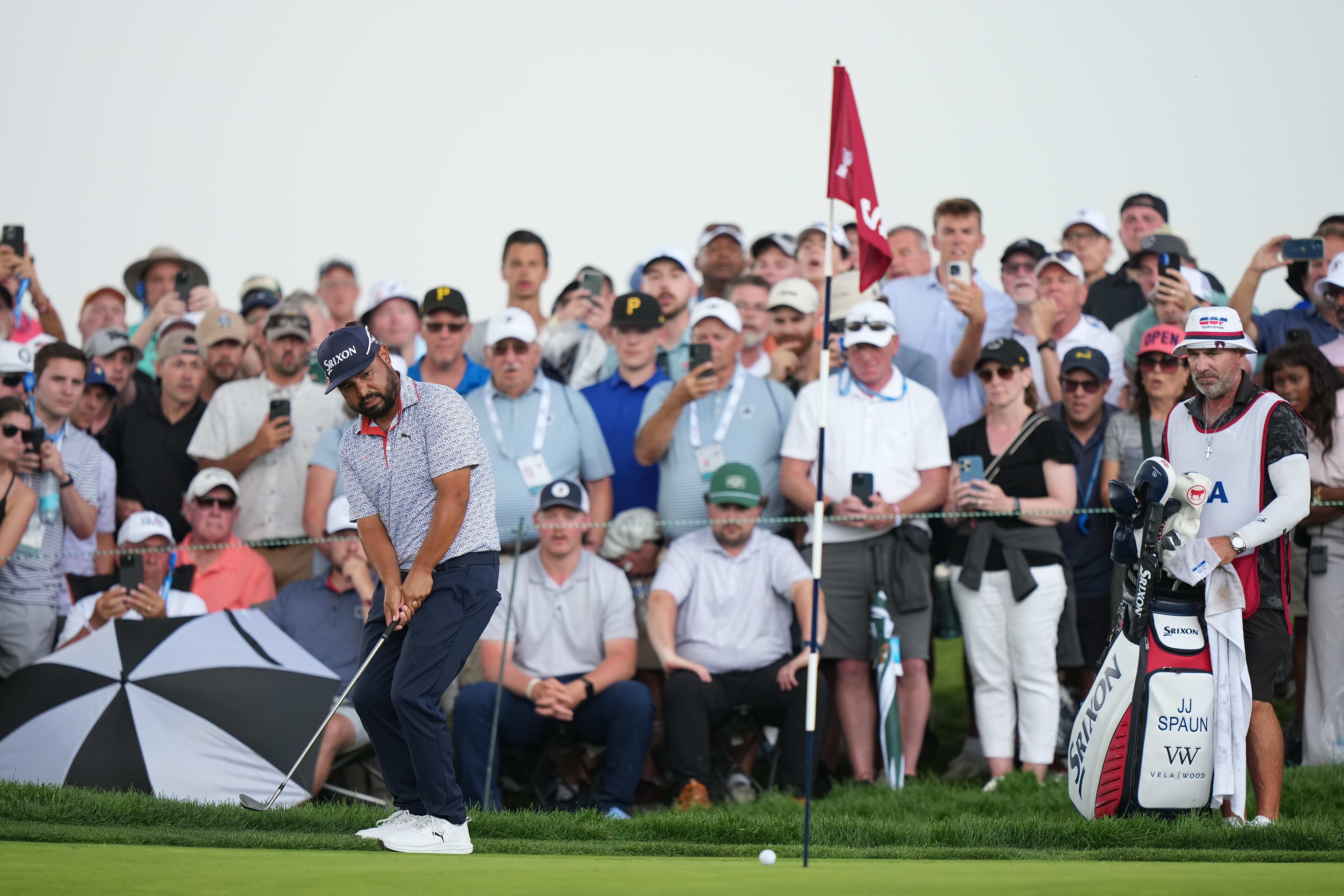 J.J. Spaun his a putt during the third round of the U.S. Open