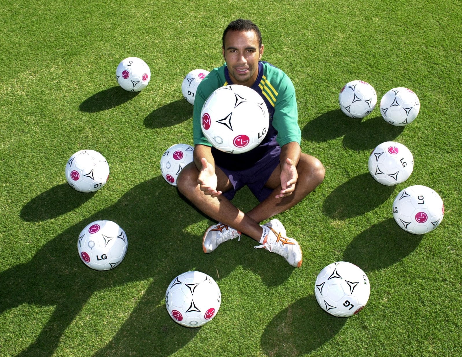 Archie Thompson with his 13 match balls after scoring 13 against American Samoa.