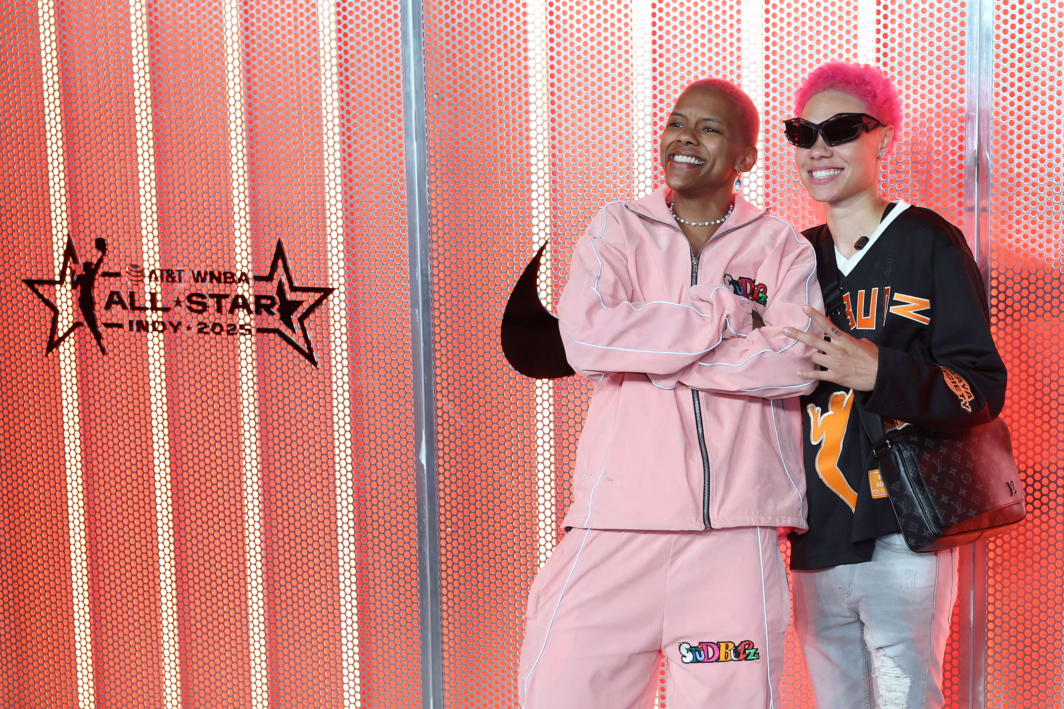 Courtney Williams and Natisha Hiedeman pose ahead of the WNBA All-Star Game.