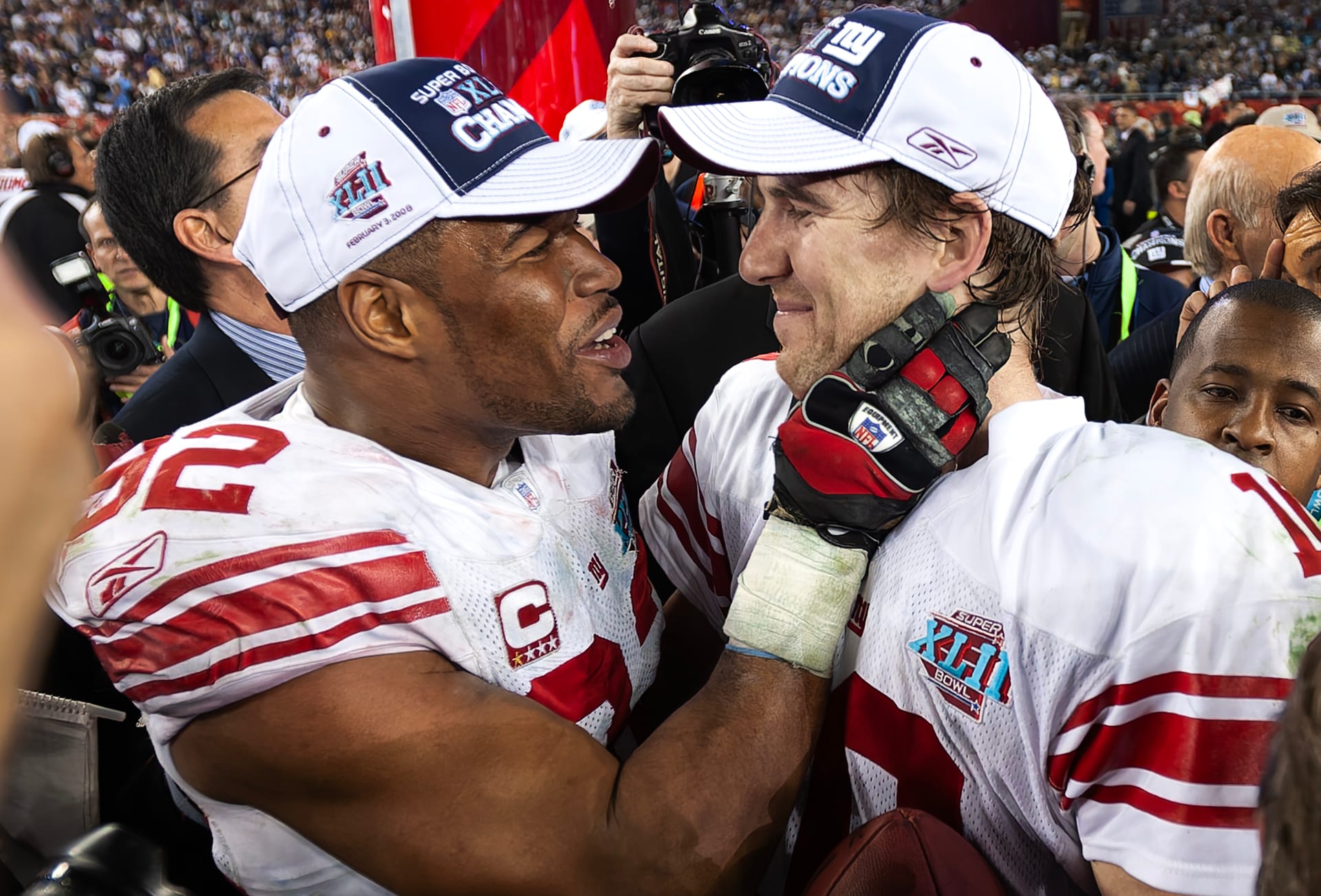 Michael Strahan and Eli Manning celebrate after winning Super Bowl XLII.