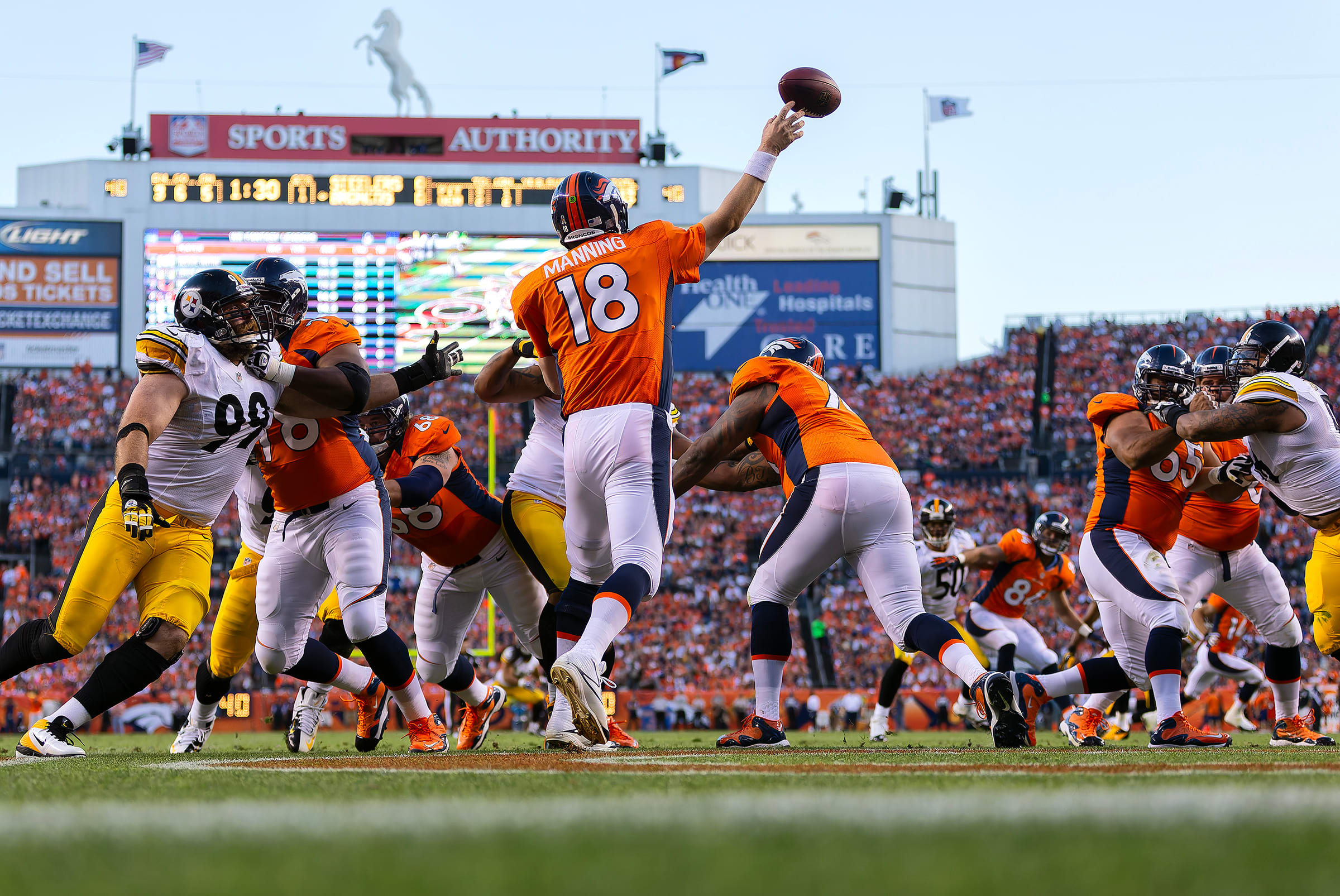 Peyton Manning throws a pass in a 2013 Broncos-Steelers game.