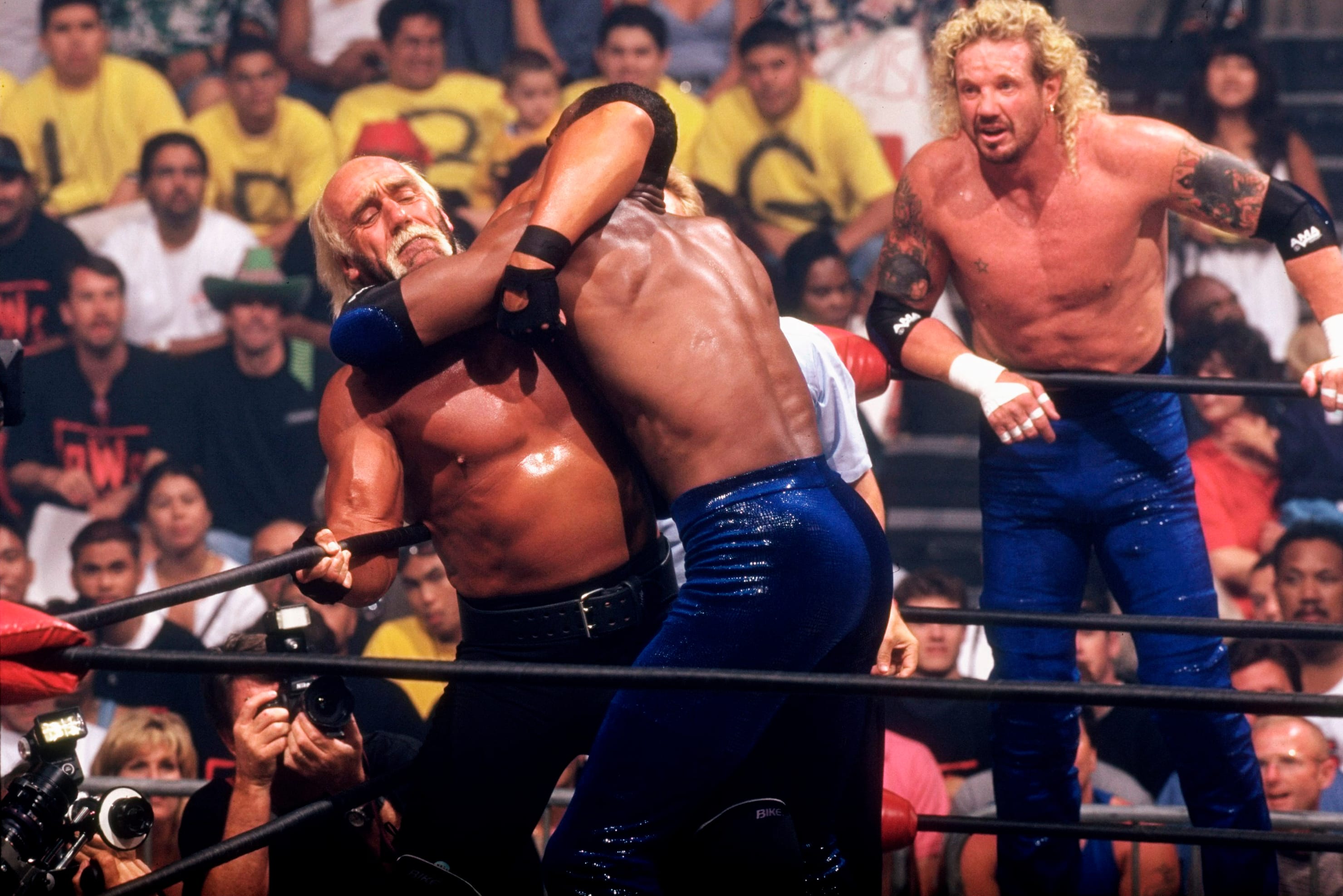 CW Bash at the Beach: Hulk Hogan in action vs Utah Jazz basketball player Karl Malone at Cox Arena