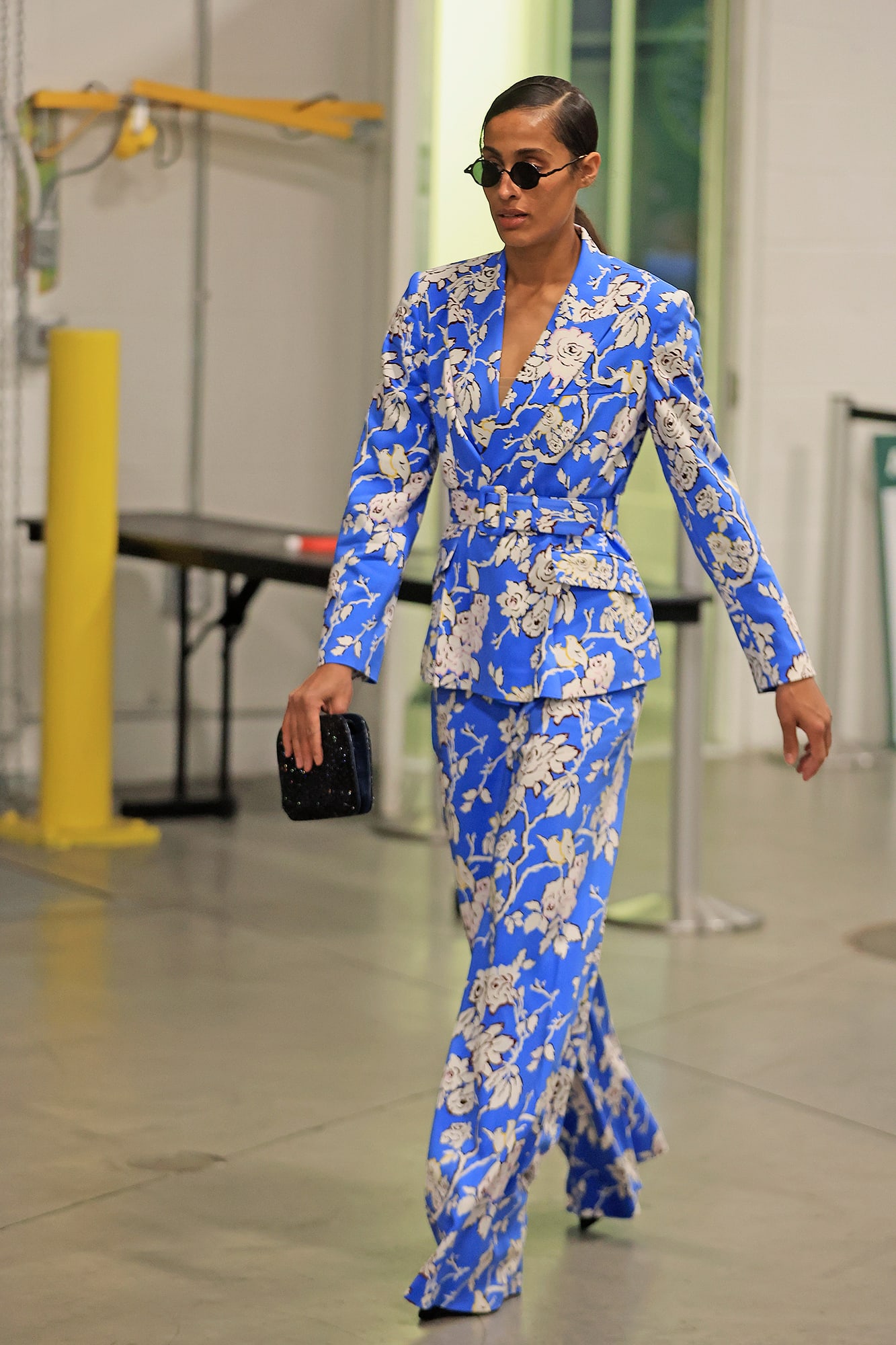 Skylar Diggins of the Storm arrives at the arena for a game in a floral blue suit