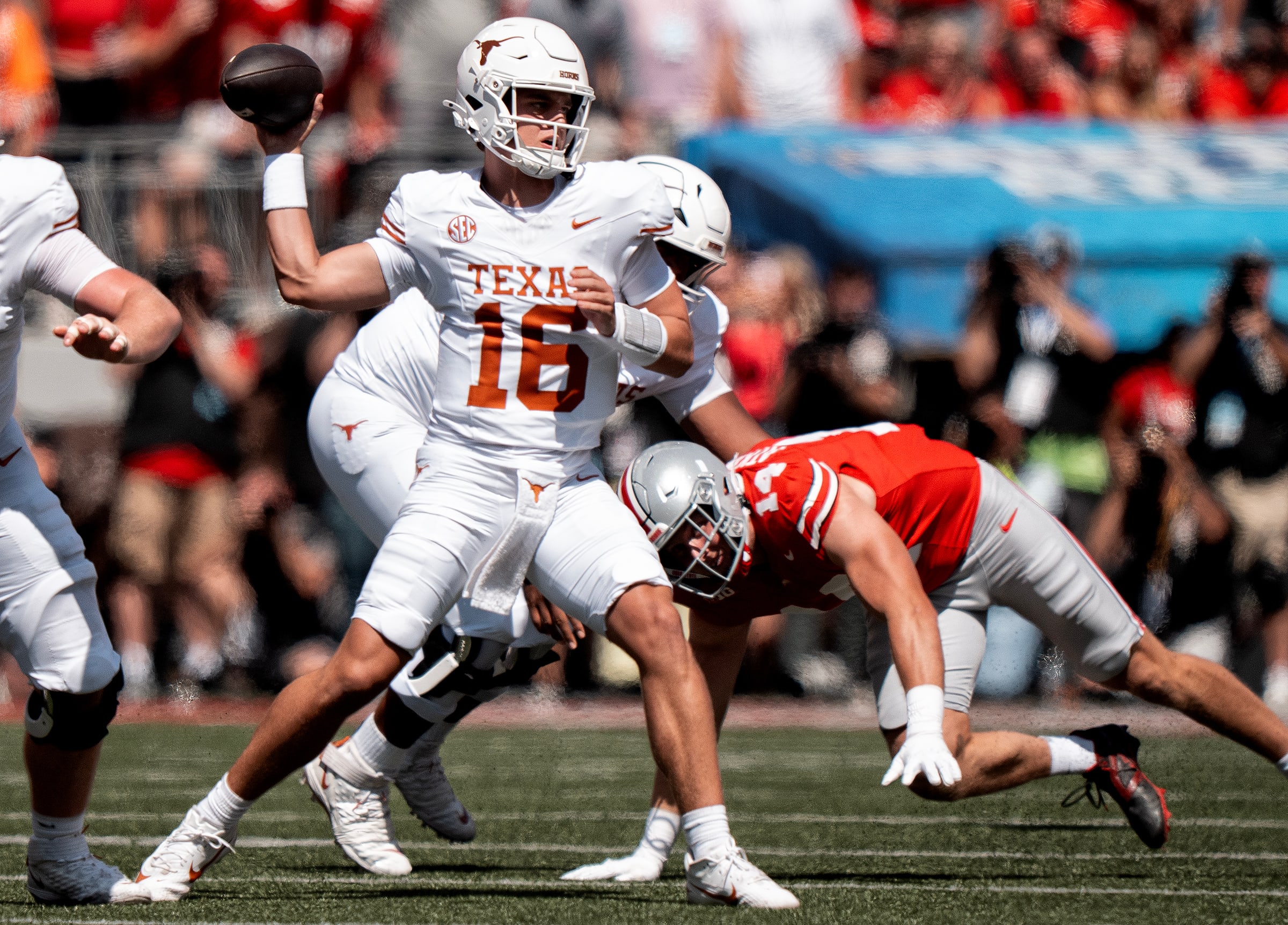 Arch Manning throws the football against Ohio State. 