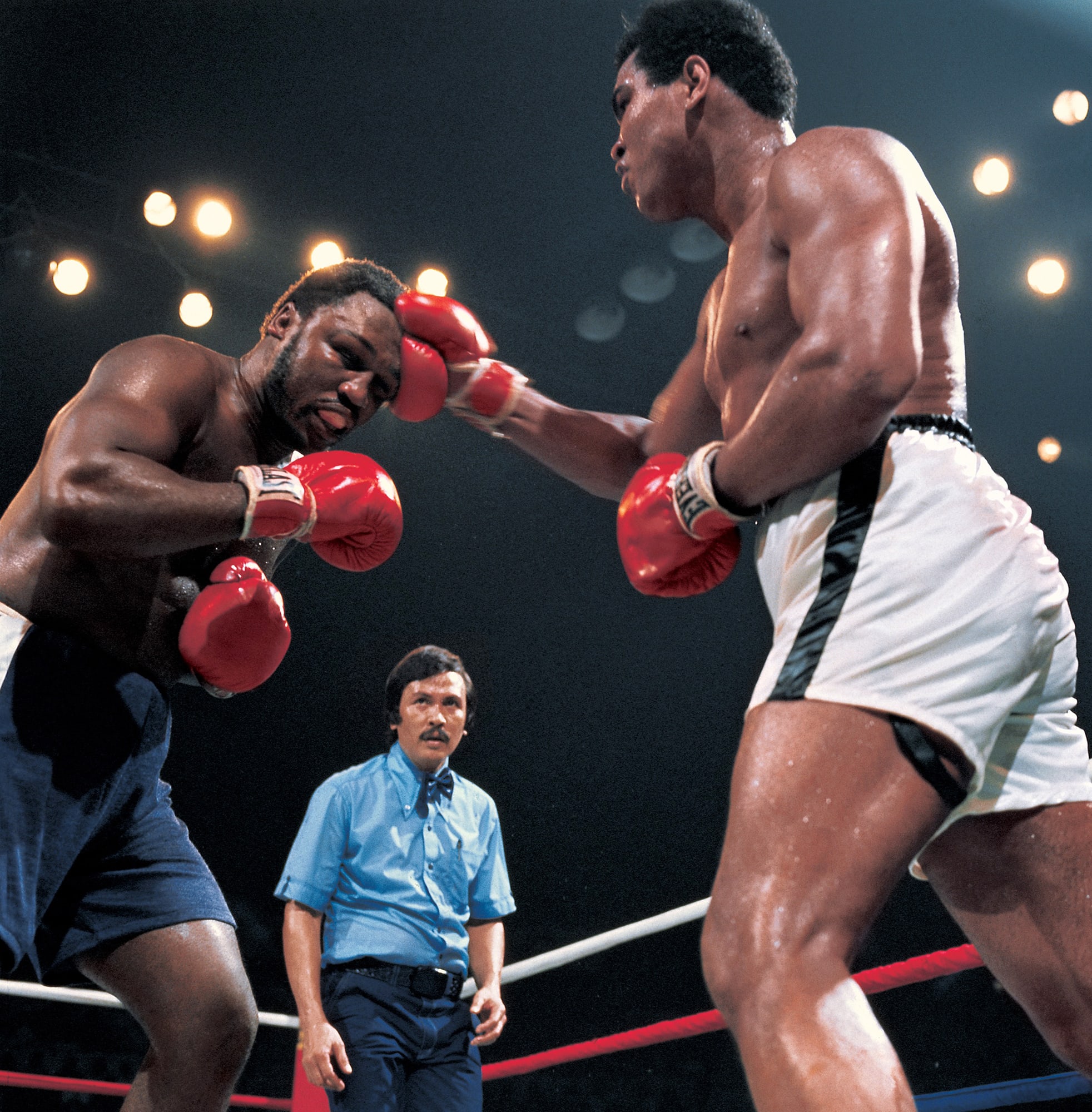Muhammad Ali, Joe Frazier, referee Carlos Padilla