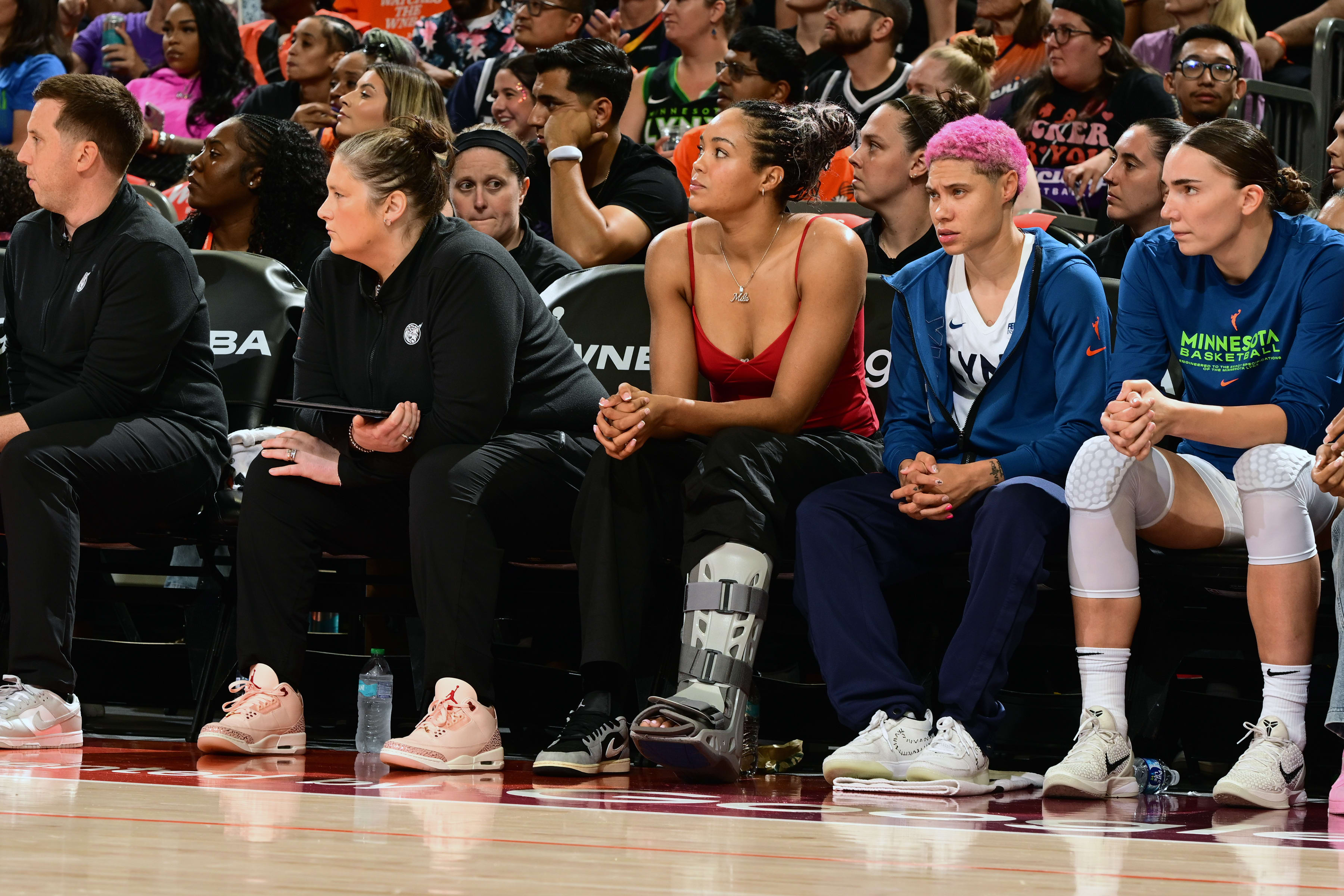 Napheesa Collier sits on the Lynx bench during Game 4 of the WNBA semifinals.