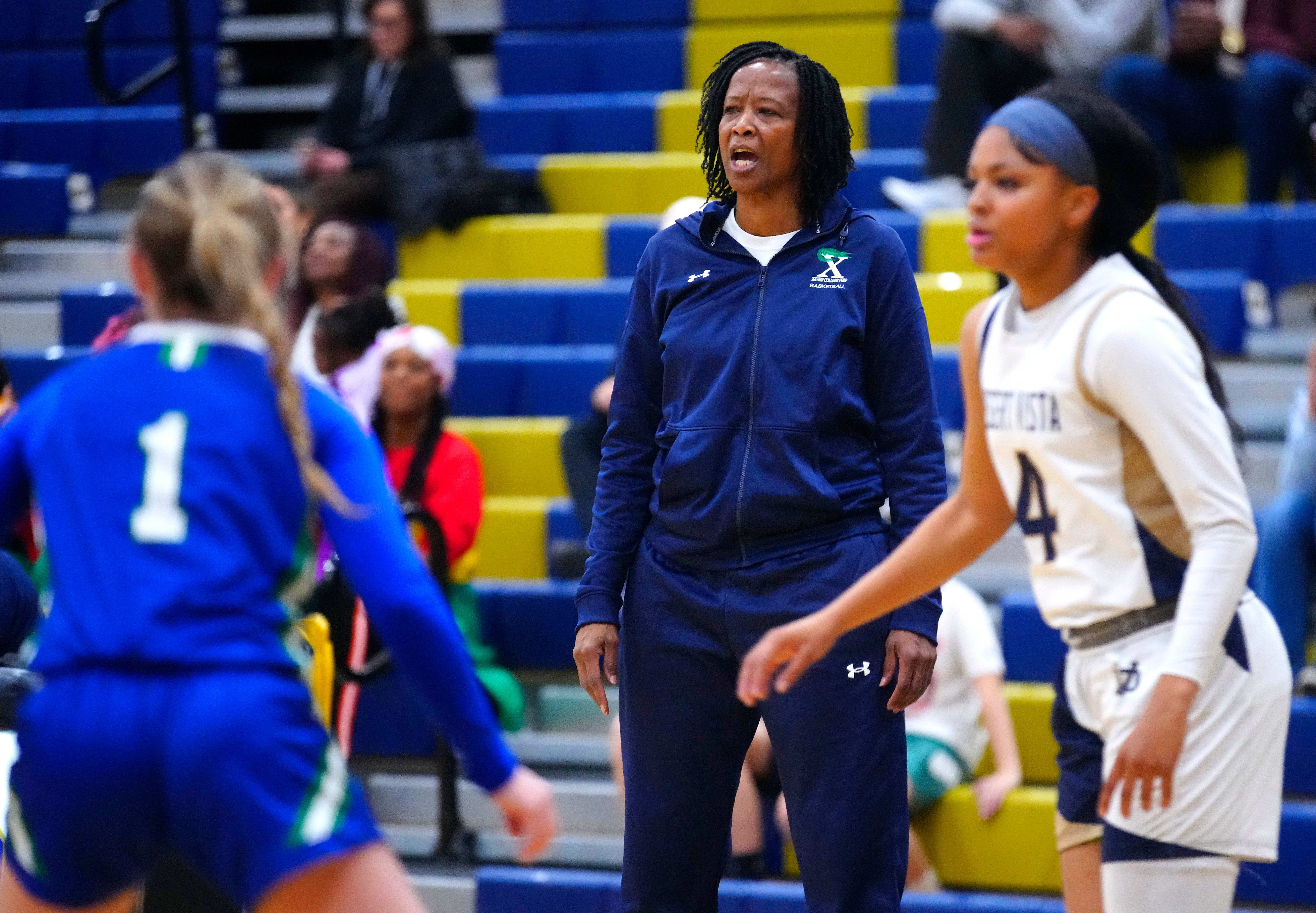 Xavier Prep head coach Jennifer Gillom calls out to her team