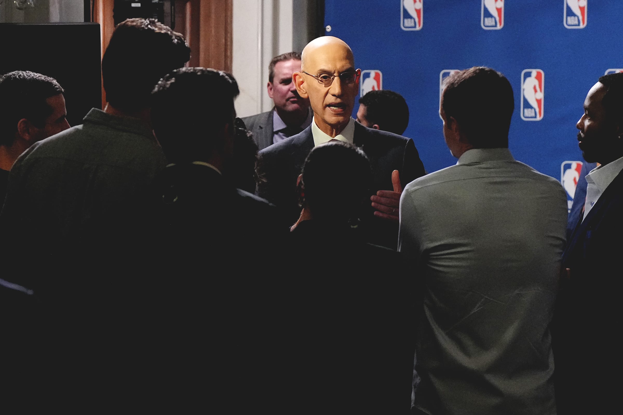 Adam Silver speaks to the media at a press conference.