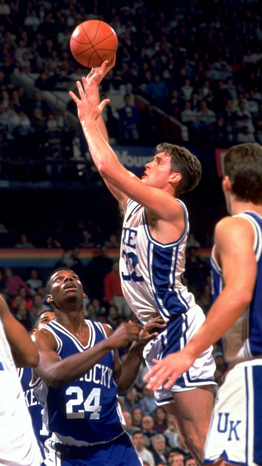 Christian Laettner’s (center) buzzer-beater remains one of the most iconic moments in March Madness history.