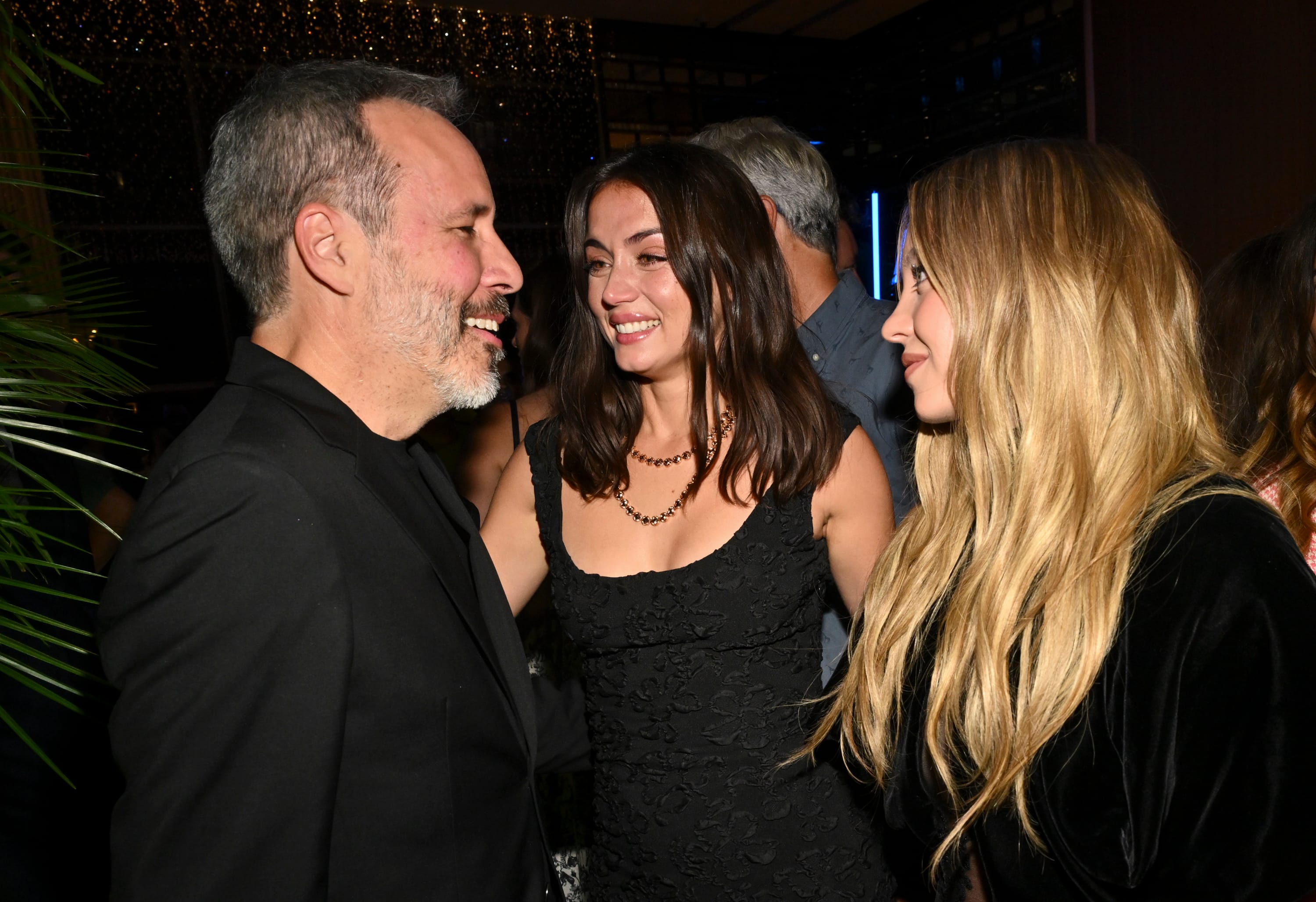 Denis Villeneuve, Ana de Armas and Sydney Sweeney seen chatting at the 2024 Toronto Film Festival.