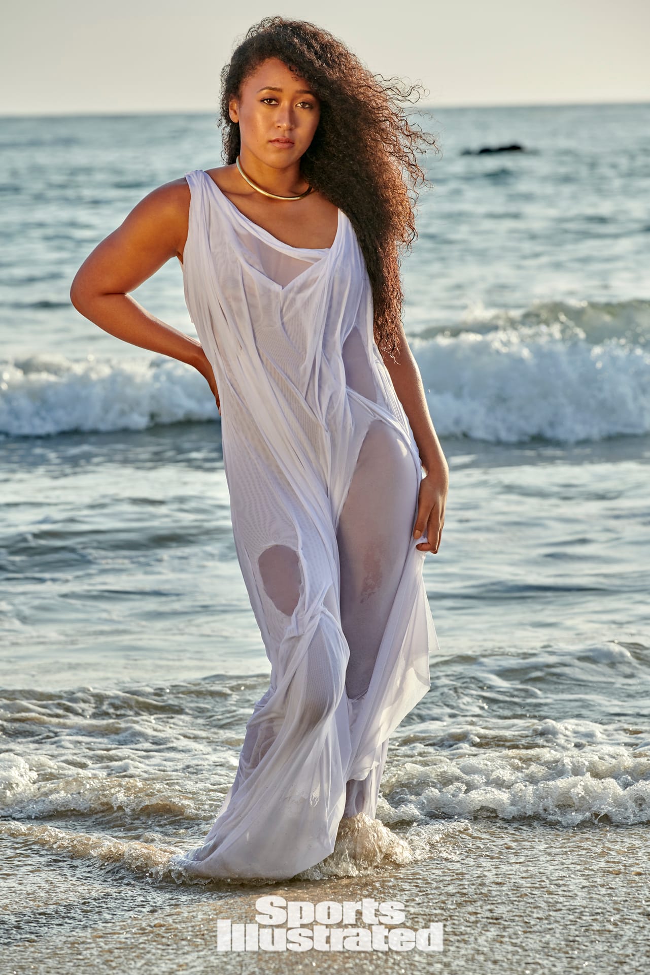 Naomi Osaka was photographed by Yu Tsai in Malibu, Calif. Dress by Di Pesta. Necklace by Khiry.