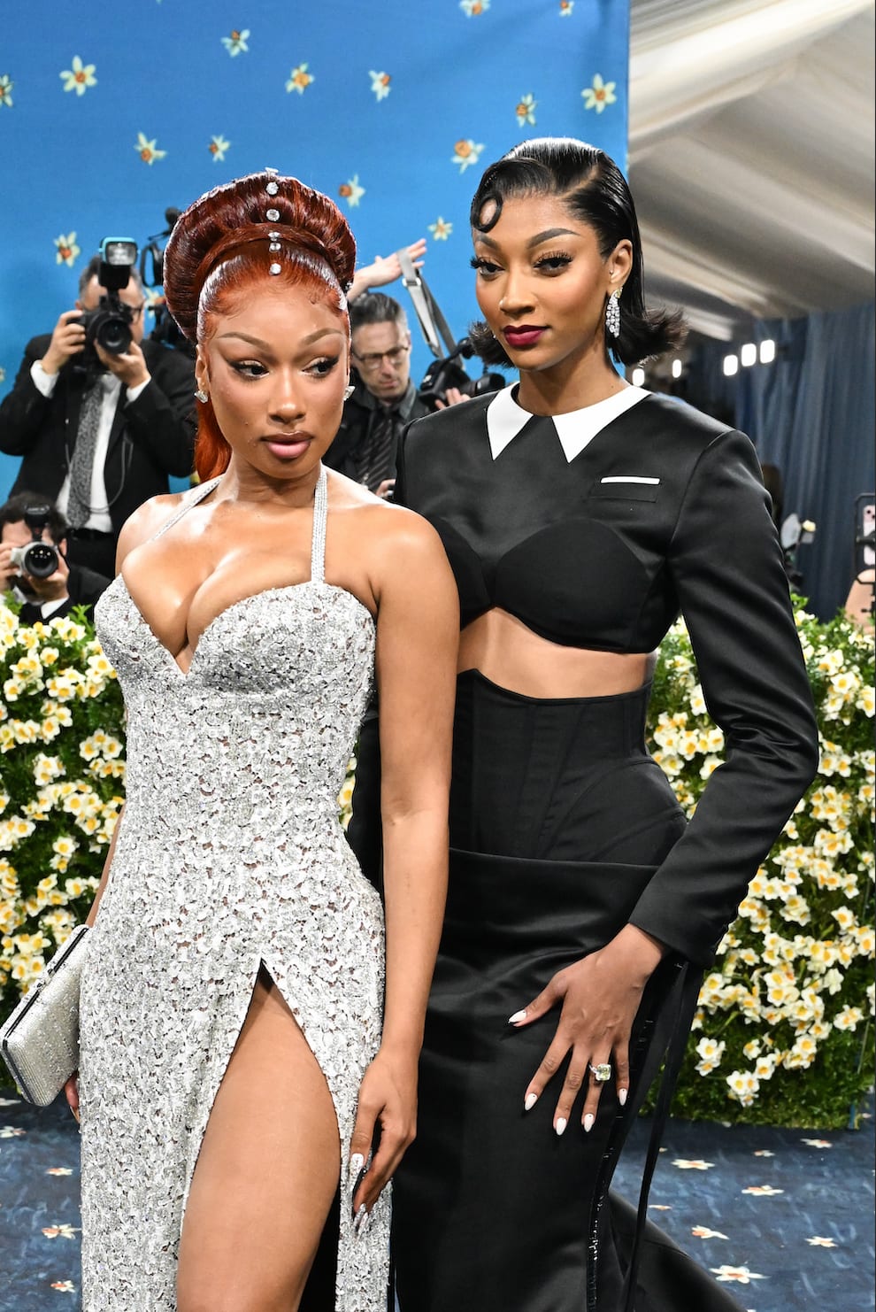 Megan Thee Stallion and Angel Reese attend the 2025 Met Gala Celebrating "Superfine: Tailoring Black Style" in New York City.