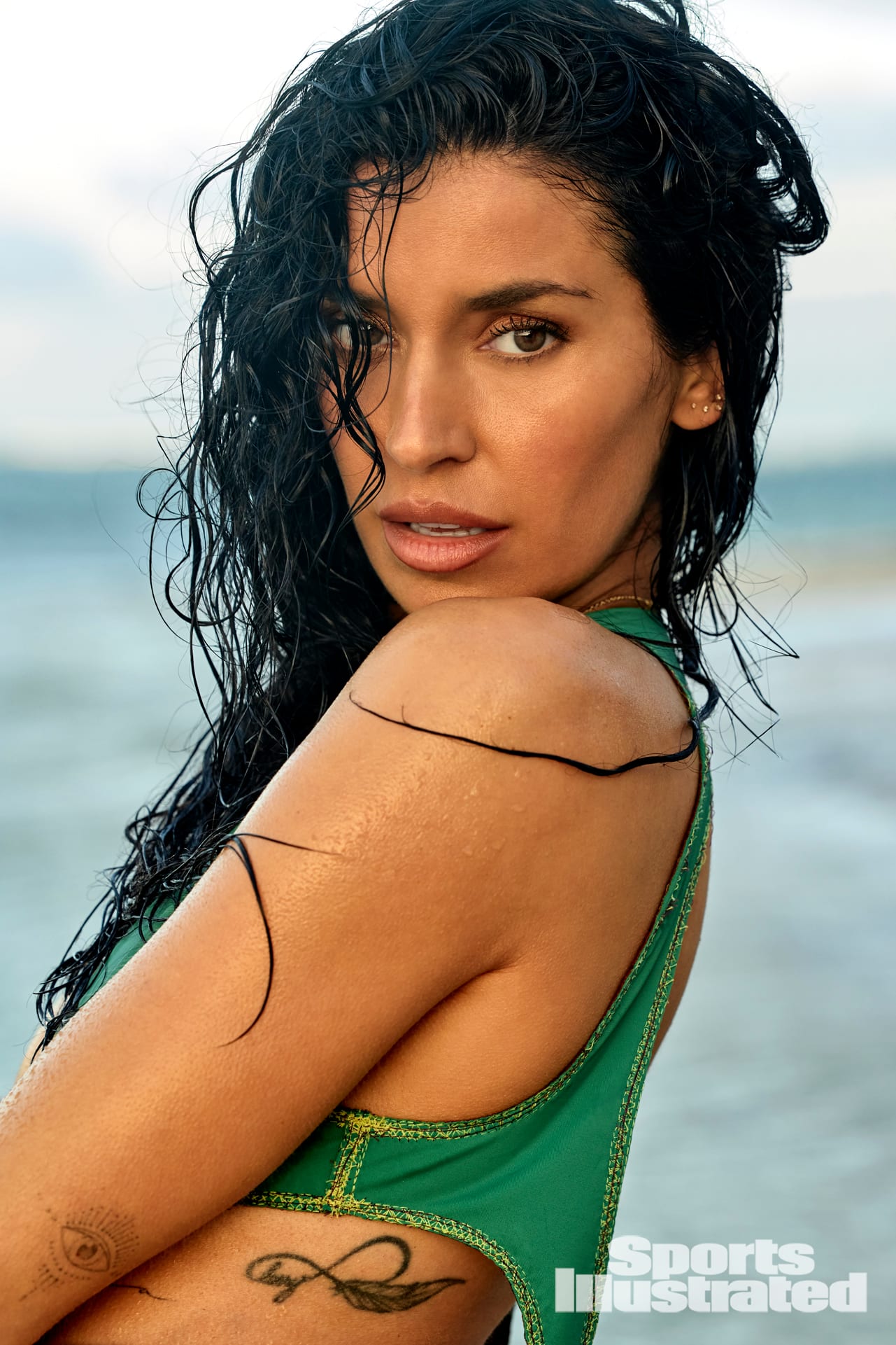 Nicole Williams English was photographed by Yu Tsai in Jamaica. Swimsuit by netta. Body chain by Jacquie Aiche.