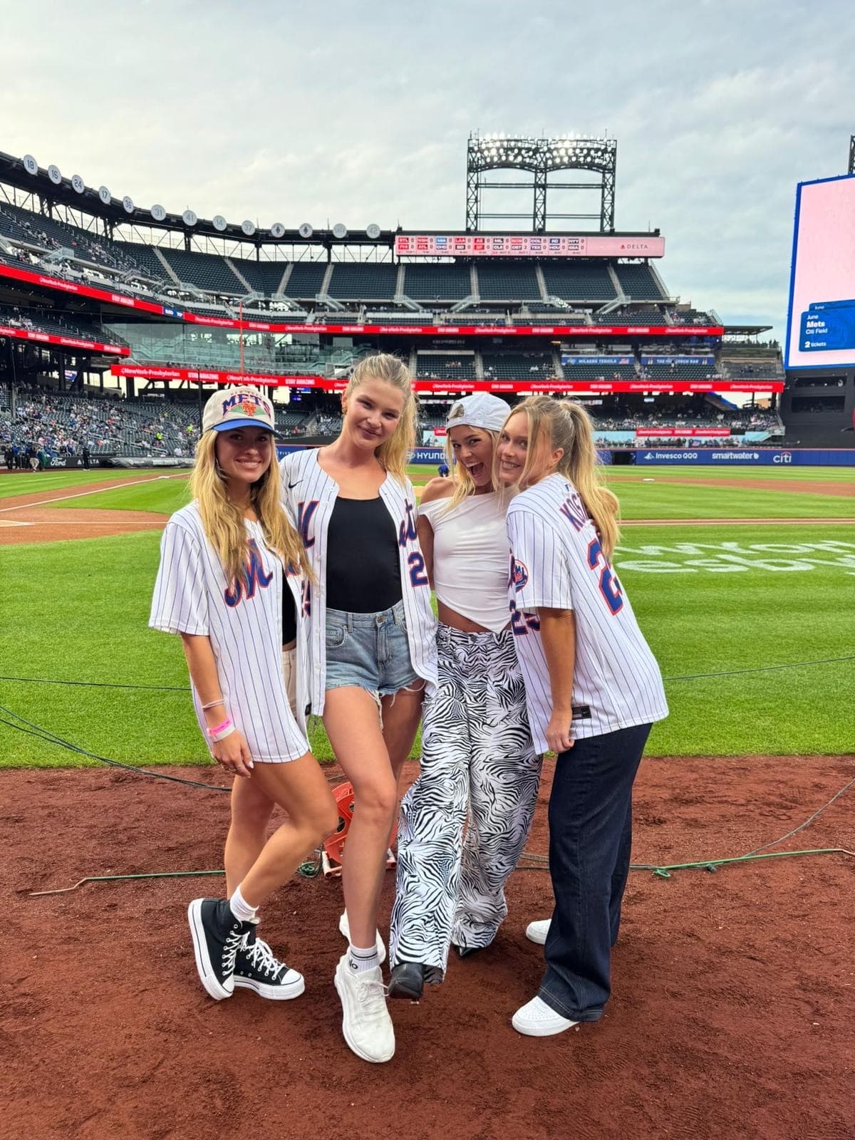 XANDRA, Ellie Thumann, Olivia Dunne, Camille Kostek at Pirates-Mets game on May 12.