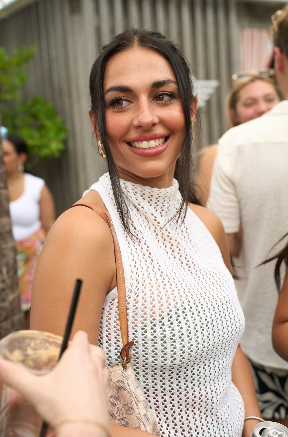Guest enjoys the Apres Swimsuit Pool Party
