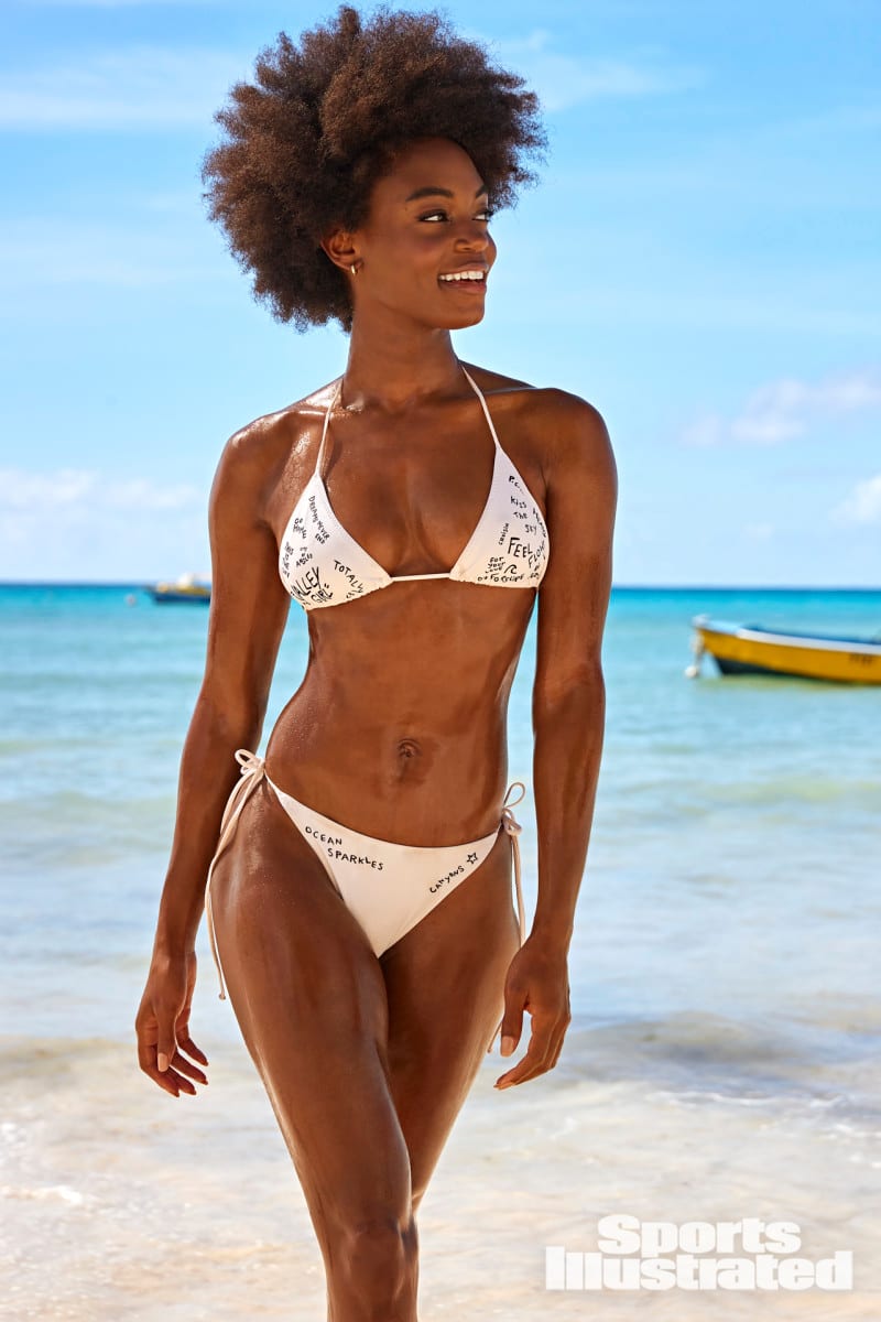 Tanyae White is wearing a white bikini in Barbados.