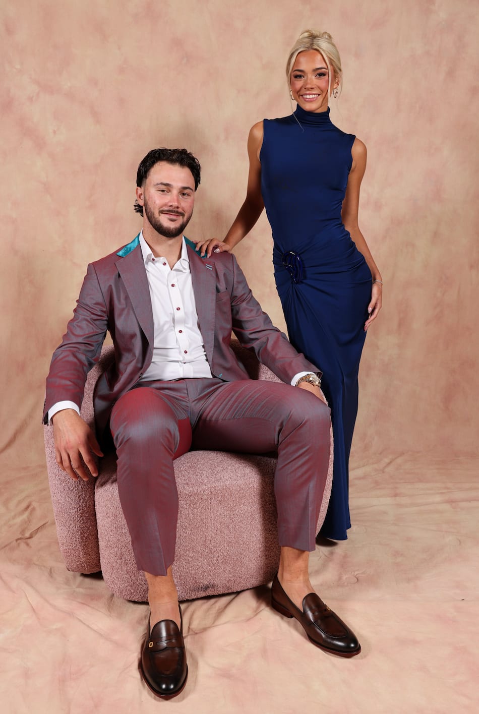 Paul Skenes and Olivia Dunne ahead of the 2025 MLB All-Star Game, posing in glamorous outfits.