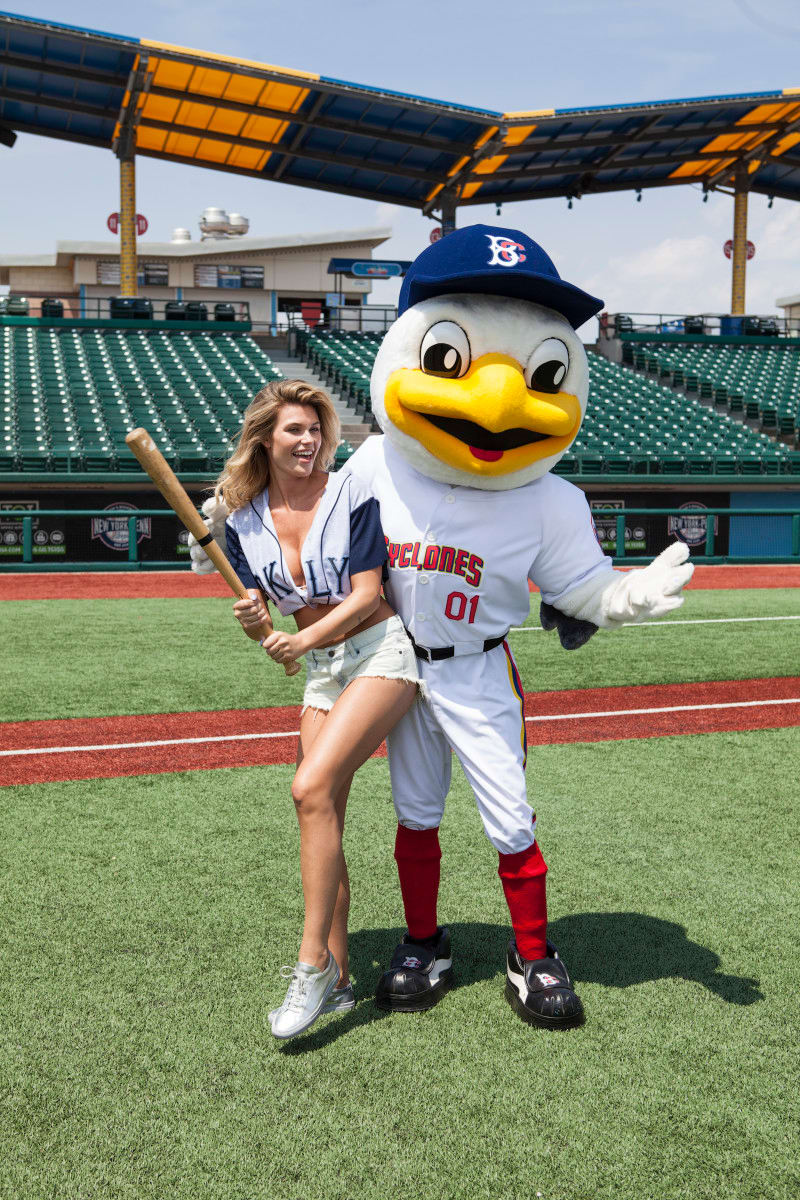 Samantha Hoopes poses next to the Brooklyn Cyclones mascot in New York. 
