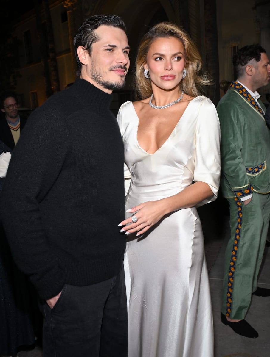 Gleb Savchenko and Brooks Nader cozy up for a photo at the ‘White Lotus’ Season 3 L.A. premiere.
