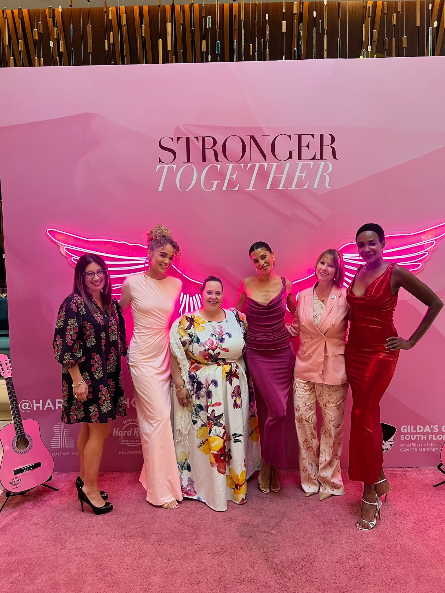 Jasmine Sanders, Nicole Williams English, Roshumba Williams and event attendees