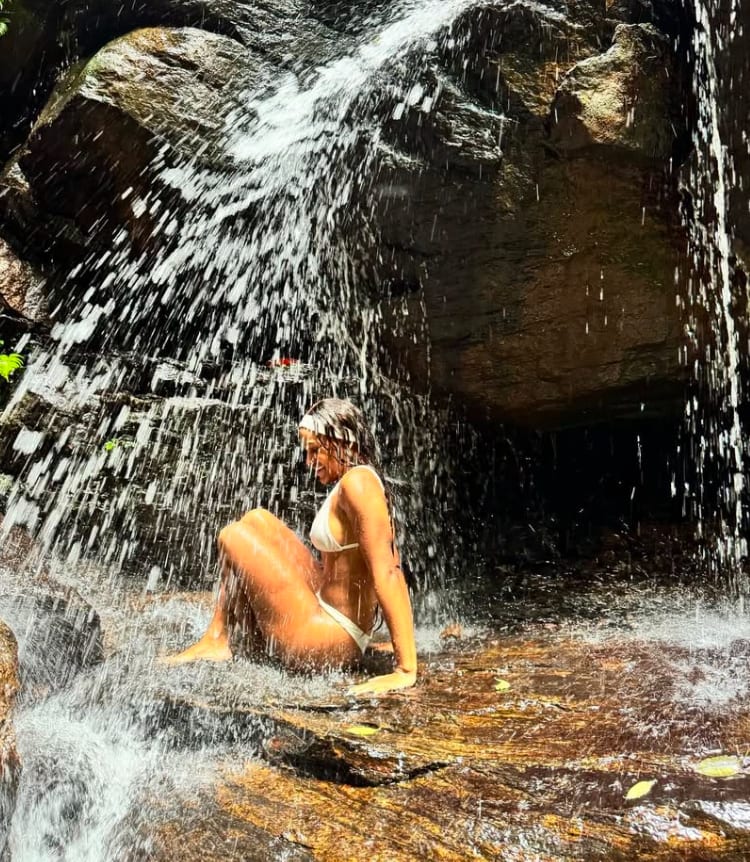 Rebeca Andrade slays Brazilian rainforest waterfall bikini stunner