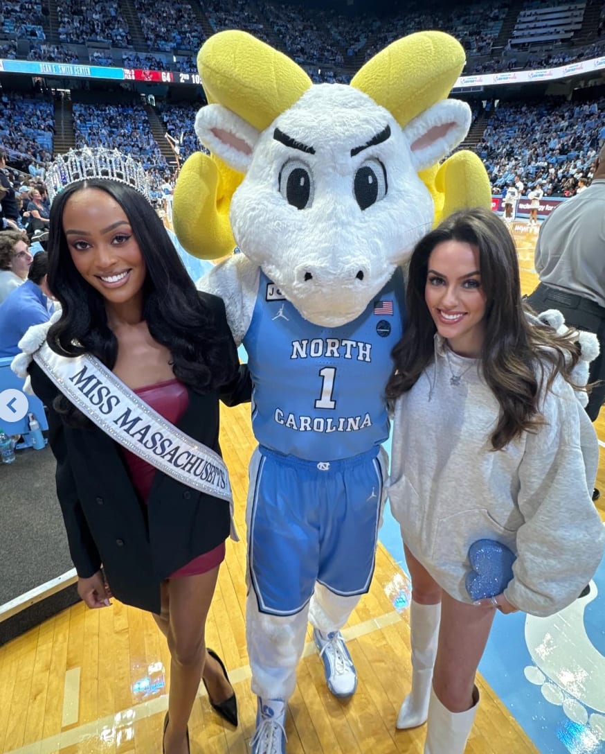 24 year old Jordon Hudson, without bf Bill Belichick, rocks white boots at UNC game