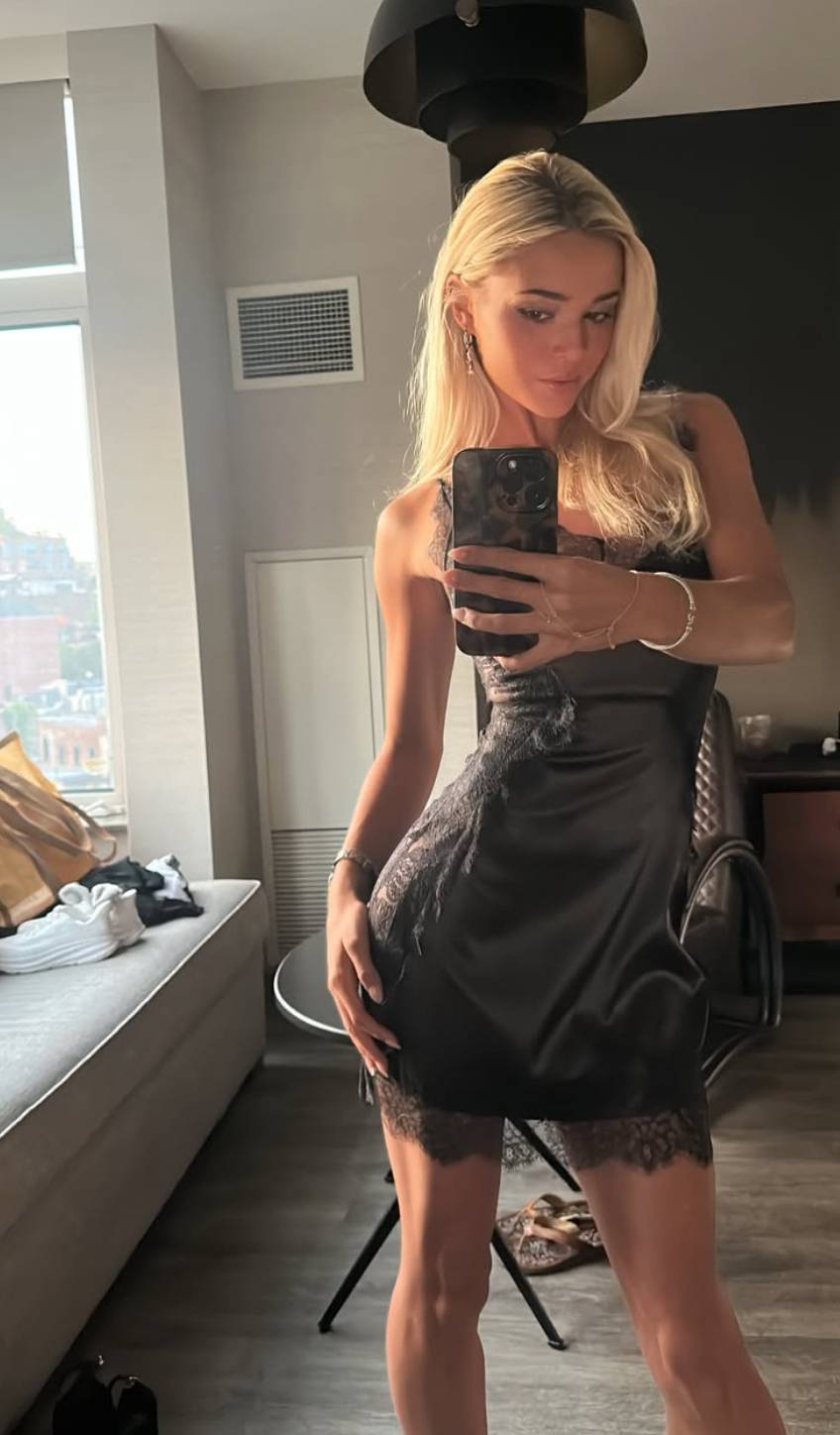 Livvy Dunne stands out in stunning black dress for NYC night out with  sister, models