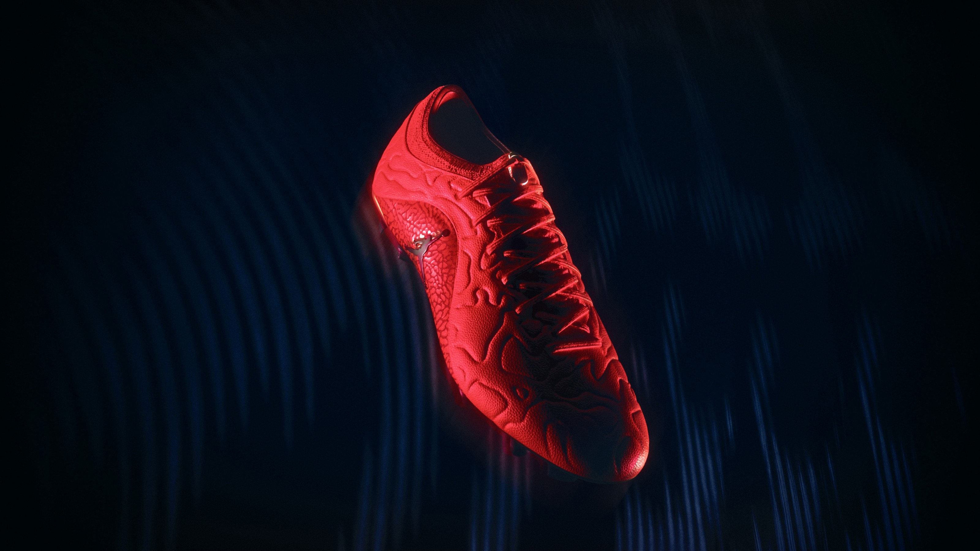 Side view of the Jordan Tiempo Maestro football boot.