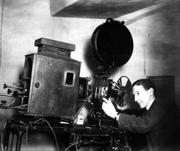 A projectionist in a town cinema, circa 1930.