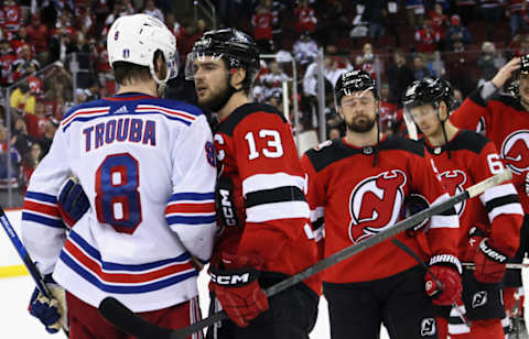 The captains shake hands after the Devils beat the Rangers in Game 7 last May