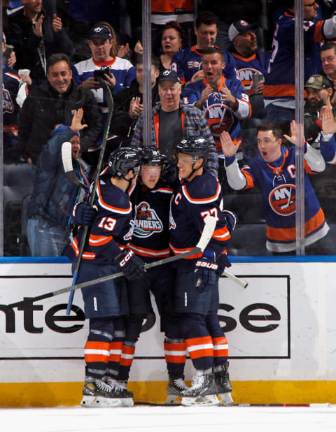 Simon Holmstrom, Anders Lee, and Mathew Barzal celebrating a power play goal, which will need to be a regular occurrence in 2023-2024. 