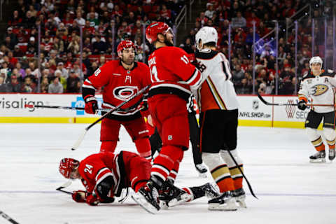 Jordans Staal and Martinook stepping in on Robert Hagg after Hagg knocked Seth Jarvis to the ice.