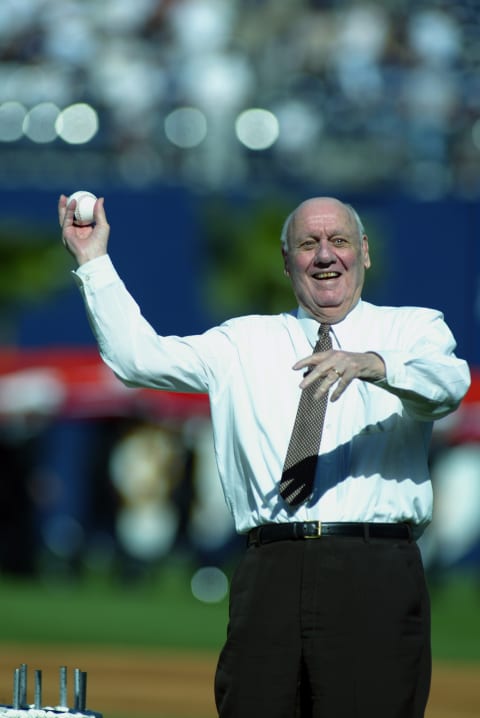 Buzzie Bavasi throws the first pitch