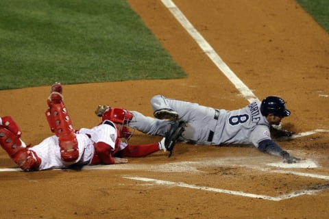 Jason Bartlett evades Carlos Ruiz's tag in the 2008 World Series.