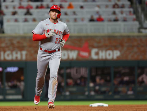 Cincinnati Reds infielder Brandon Drury rounds the bases.