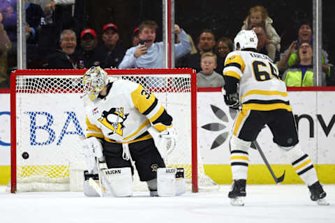 Pittsburgh Penguins goaltender Tristan Jarry allows a goal during a game against the Carolina Hurricanes on Jan. 13, 2024 at PNC Arena.