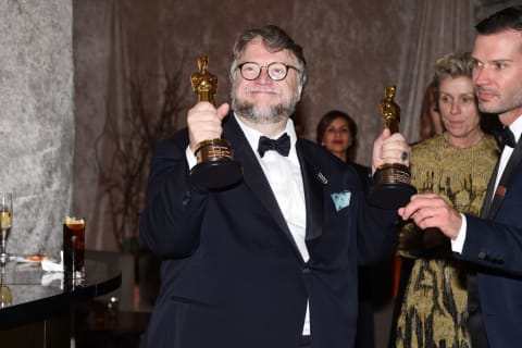 Guillermo del Toro holds up his Oscar for 'The Shape of Water.'