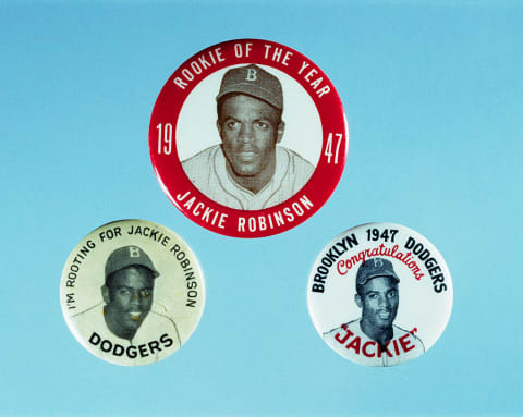 Three Jackie Robinson buttons.