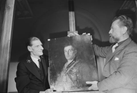 The portrait being handed over to the National Gallery's chief art restorer Arthur Lucas (right) on May 25, 1965. 