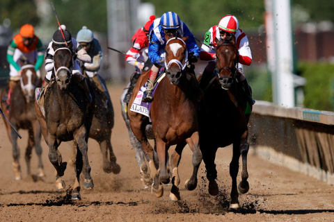 Jockeys jockeying for position at the 2021 Kentucky Oaks.